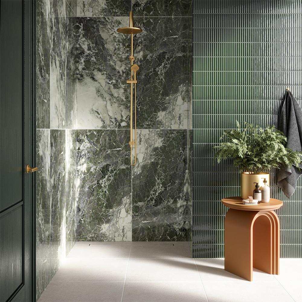 Green marble bathroom tiles with green kit kat tiles and plain white floor tiles